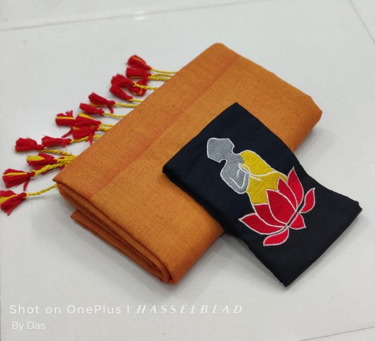 Looking Ochre Yellow Cotton Soft Silk Saree
